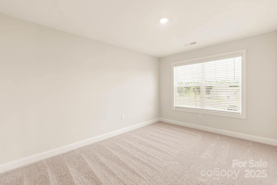 Spacious, unfurnished interior of a new home in Colonial Crossing, Troutman (Image 15).