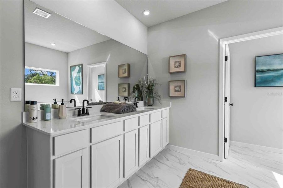 Furnished interior view inside a new home in The Cypress Series at Reserve East, Flagler Beach (Image 30).