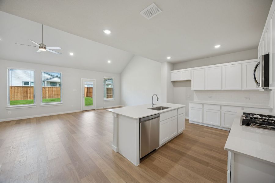 Open Floor Plan in the Masters home plan by Trophy Signature Homes – REPRESENTATIVE PHOTO