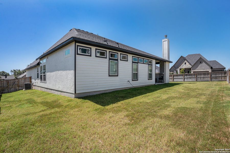 Front exterior of a new home in Mesa Western, Cibolo, TX, highlighting curb appeal (Image 21).