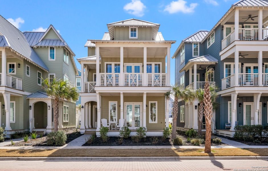 Front exterior of a new home in , Port Aransas, TX, highlighting curb appeal (Image 20). Front exterior of a new home in , Port Aransas, TX, highlighting curb appeal (Image 20).
