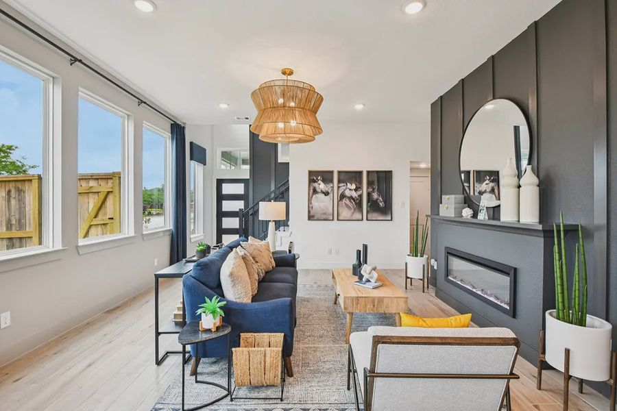 Furnished interior view inside a new home in Meridiana Chateau, Manvel (Image 18).