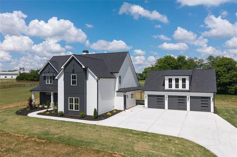 Front exterior of a new home in , Carrollton, GA, highlighting curb appeal (Image 28).