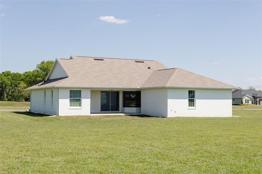 Front exterior of a new home in , Ocala, FL, highlighting curb appeal (Image 1).