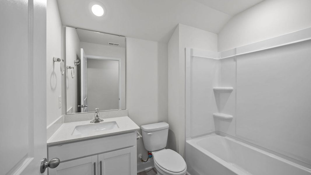 Furnished interior view inside a new home in Villa Grande, Winterville (Image 12).