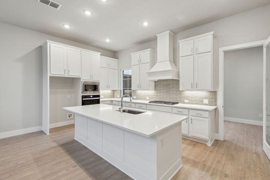 Furnished interior view inside a new home in Newman Village Townhomes, Frisco (Image 18).