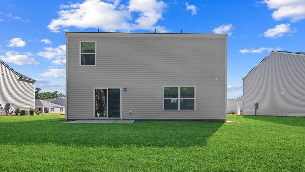 Front exterior of a new home in Cobblestone Village, Savannah, GA, highlighting curb appeal (Image 2).