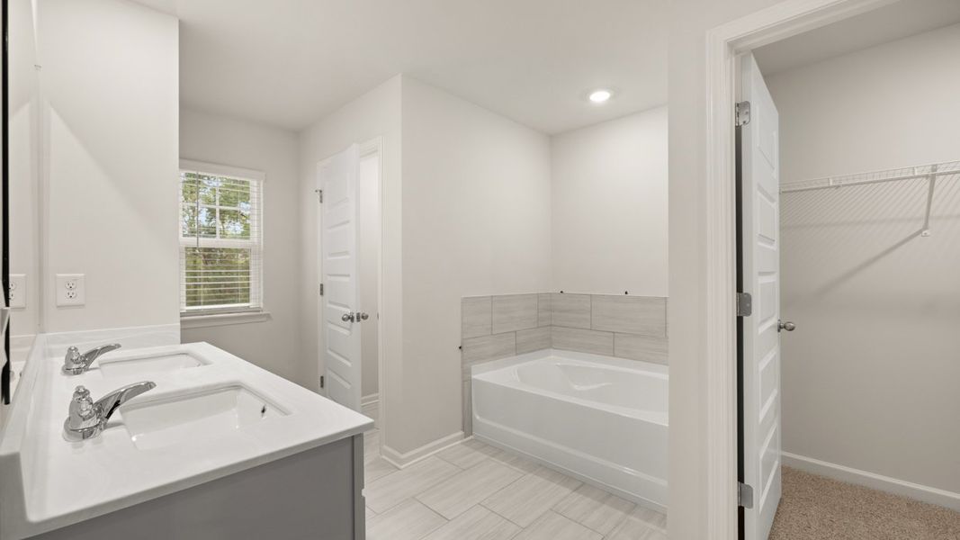 Furnished interior view inside a new home in Independence Villas and Townhomes, Loganville (Image 9).