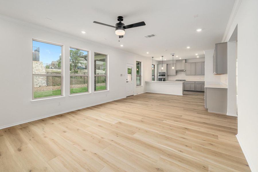 Spacious, unfurnished interior of a new home in River Bluff, Leander (Image 32).