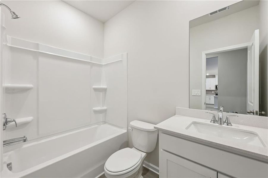 Furnished interior view inside a new home in Parkside at Grayson, Grayson (Image 9).