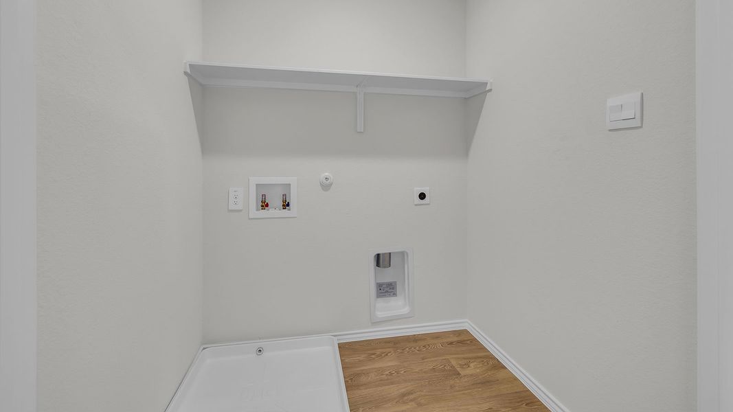 Representative unfurnished interior of a home built from the The Franklin by D.R. Horton in Spring Valley, New Braunfels (Image 27).