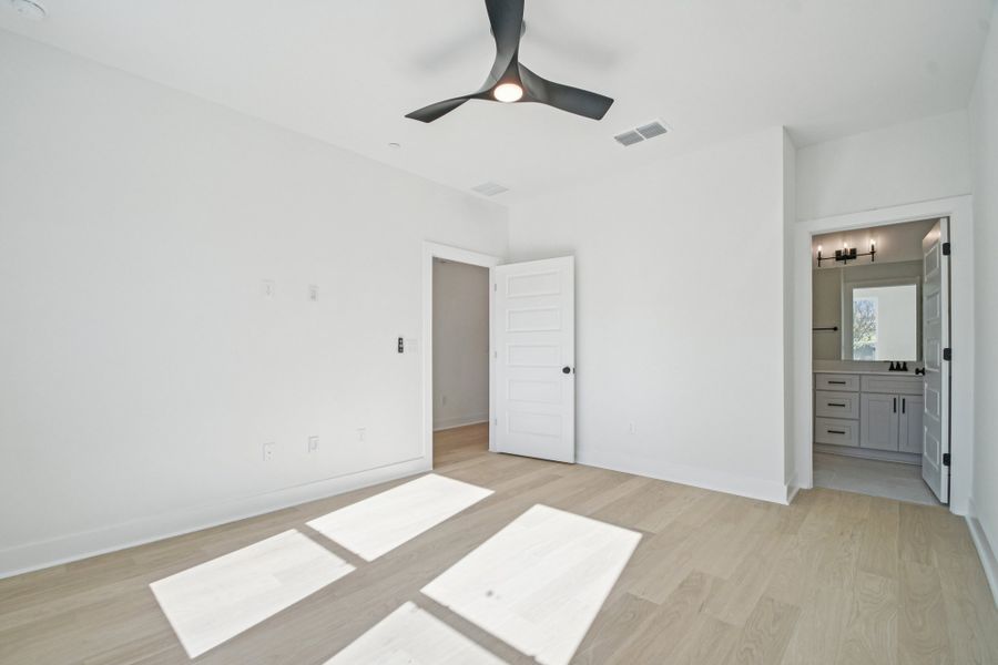 Spacious, unfurnished interior of a new home in Koenig Townhomes, Austin (Image 16).