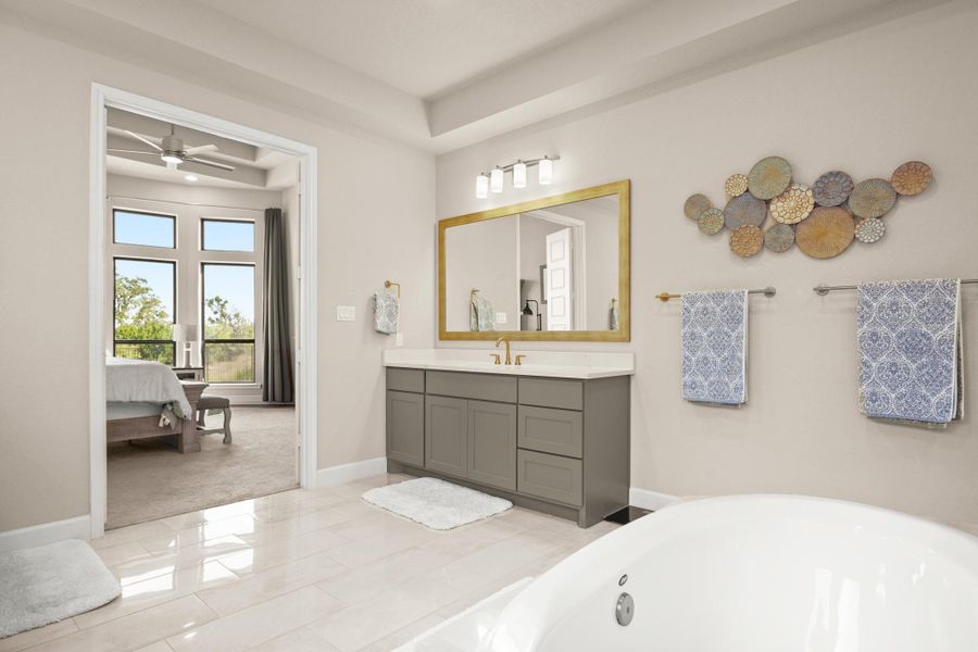 Full bathroom with vanity, a tub, light tile patterned floors, ensuite bath, and a ceiling fan Full bathroom with vanity, a tub, light tile patterned floors, ensuite bath, and a ceiling fan