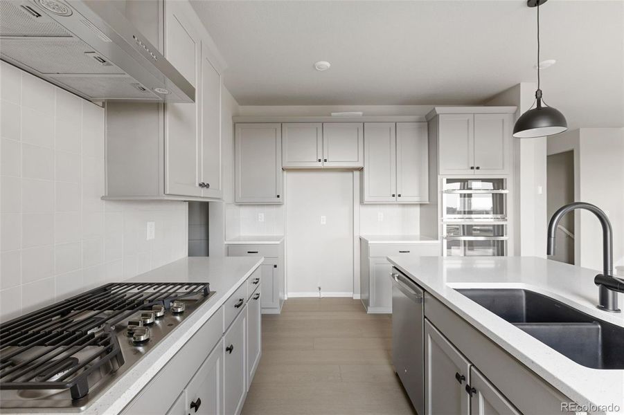 Furnished interior view inside a new home in The Legacy Collection at Talon Pointe, Thornton (Image 9).