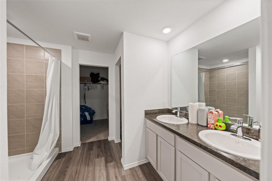 Furnished interior view inside a new home in The Canopies, Splendora (Image 14).