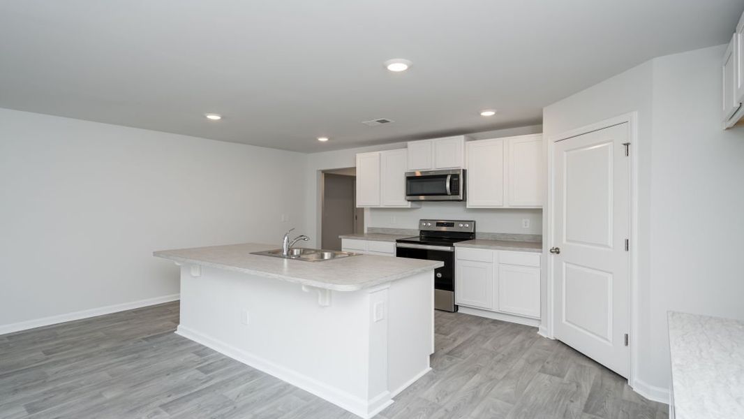 Representative furnished interior of a home built from the CALI by D.R. Horton in Jordanville Farms, Galivants Ferry (Image 10).