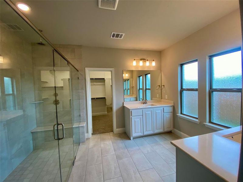 Oversized 12x24 tile in all bathrooms Oversized 12x24 tile in all bathrooms