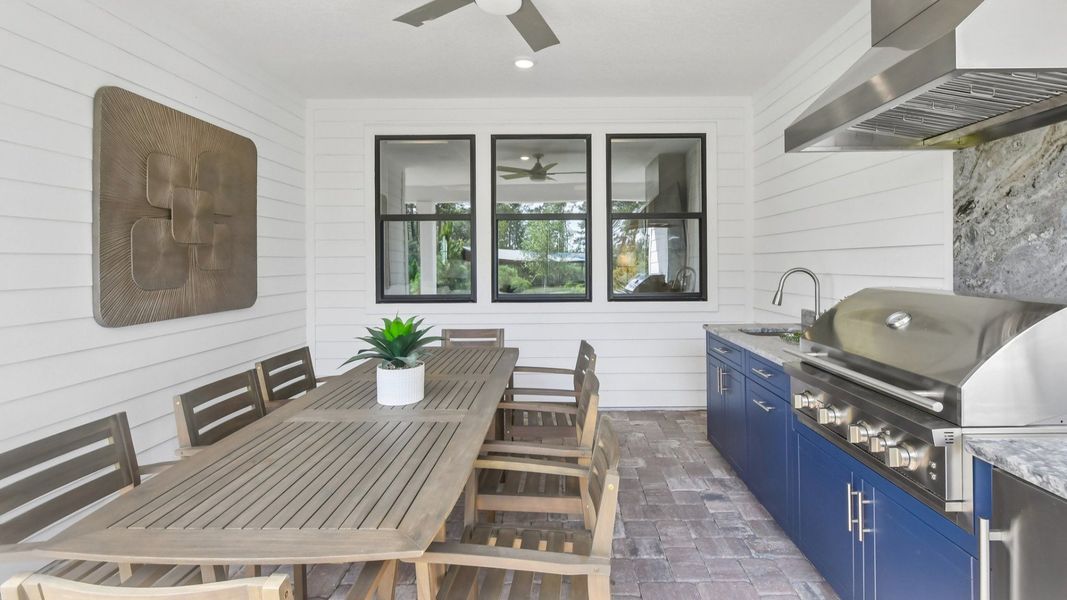 Summer Kitchen and Outdoor Seating Area of the Marigold Floor Plan at Haven at Diamond Springs