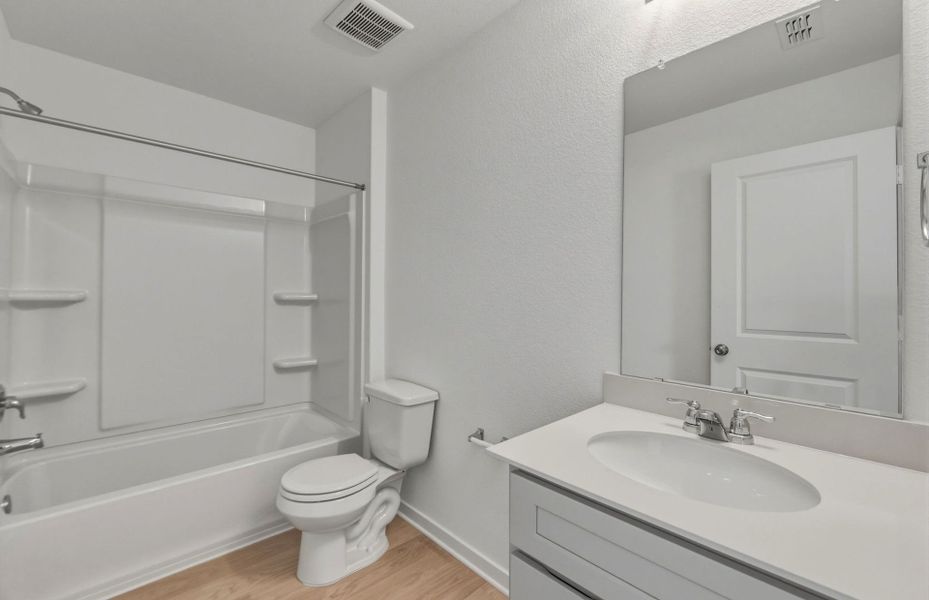 Furnished interior view inside a new home in Sunfield, Buda (Image 8).