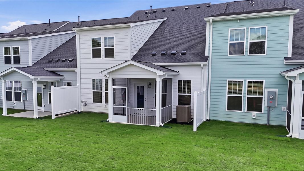 Notable exterior includes a rear screened-in porch designed for year-round enjoyment at the Village at Midway community Notable exterior includes a rear screened-in porch designed for year-round enjoyment at the Village at Midway community