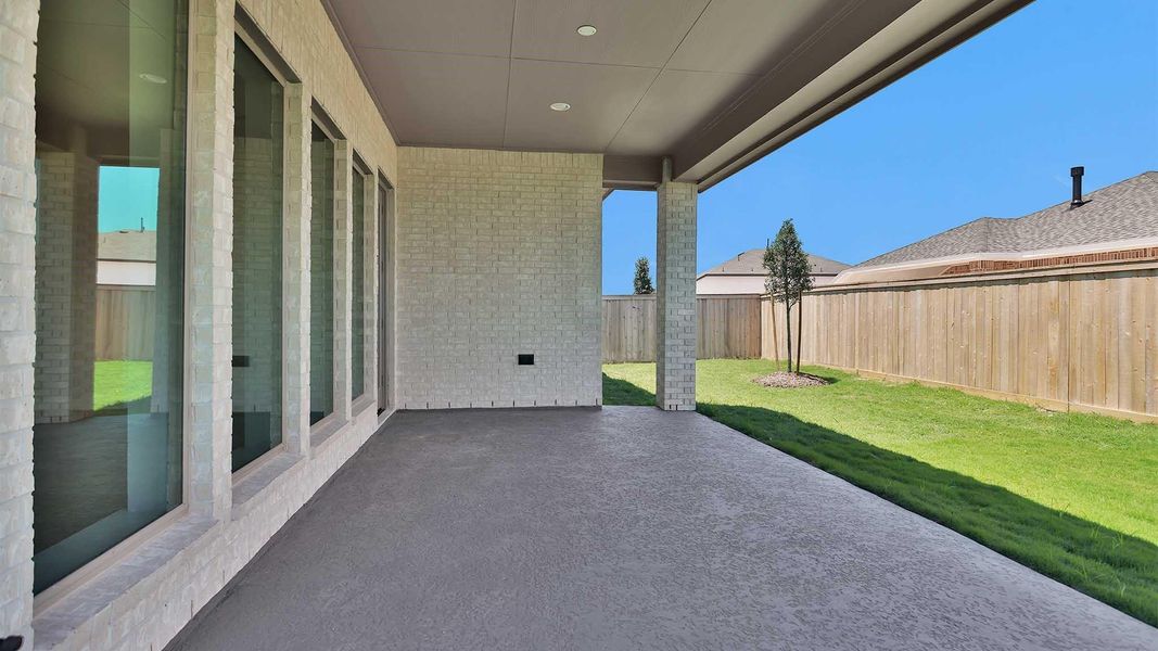 Exterior details and patio area of a home in Bridgeland, Cypress (Image 3). Exterior details and patio area of a home in Bridgeland, Cypress (Image 3).