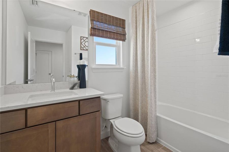 Furnished interior view inside a new home in Trinity Place, St. Cloud (Image 40).