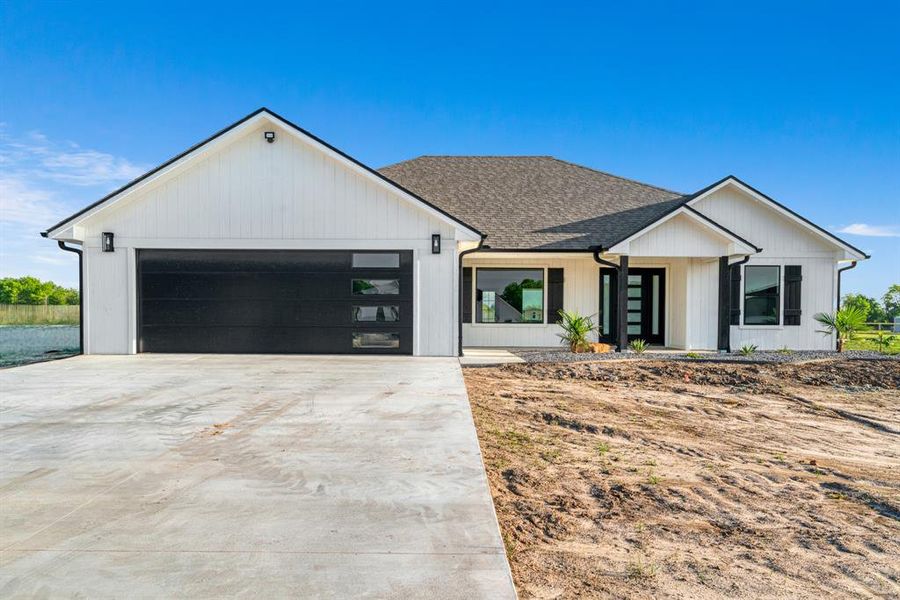 Front exterior of a new home in , Brookston, TX, highlighting curb appeal (Image 16).