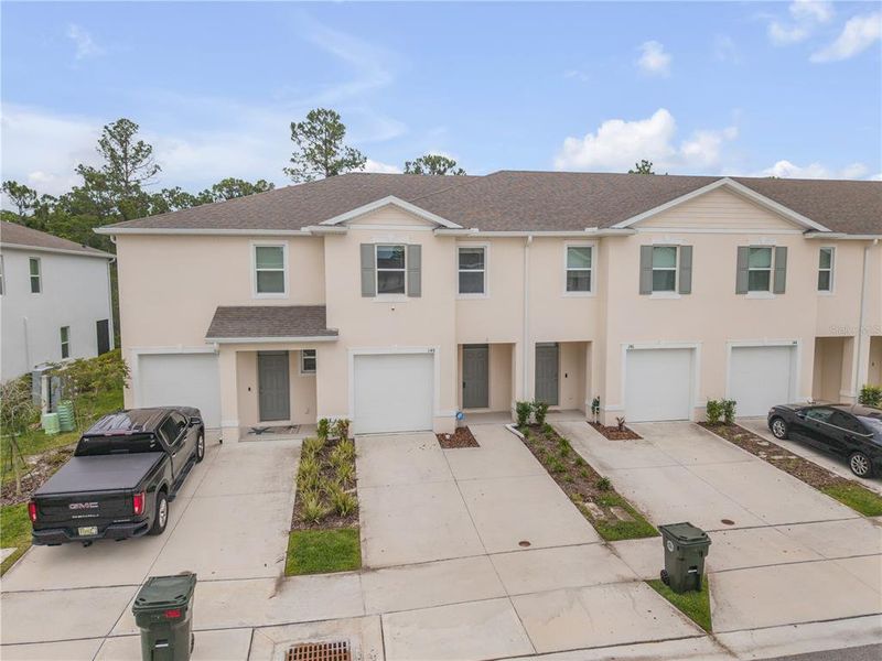 Front exterior of a new home in , Daytona Beach, FL, highlighting curb appeal (Image 24). Front exterior of a new home in , Daytona Beach, FL, highlighting curb appeal (Image 24).
