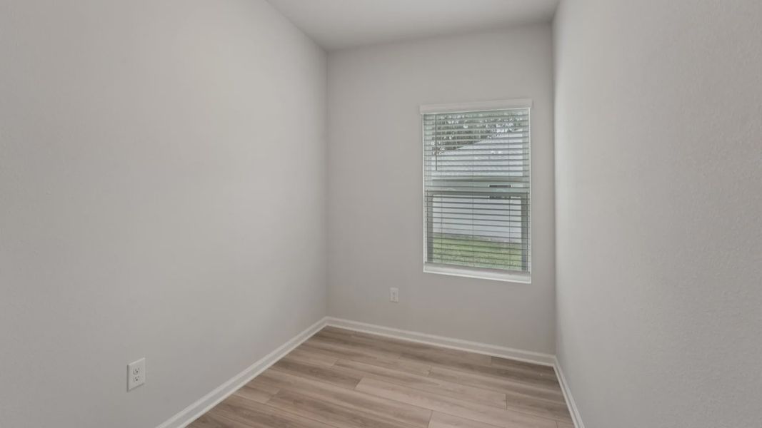 Light wood flooring and natural light enhance this intimate space, creating a serene ambiance in Palm Coast.