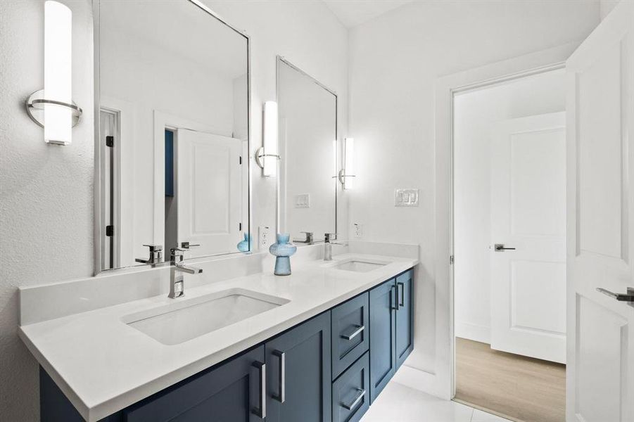 Full bathroom featuring double vanity