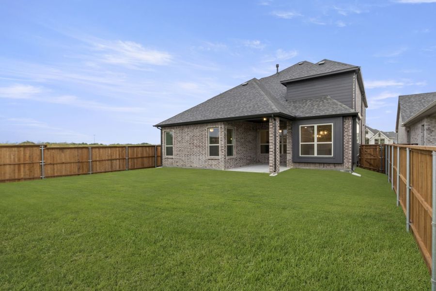 Exterior details and patio area of a home in River Ranch, Van Alstyne (Image 20).