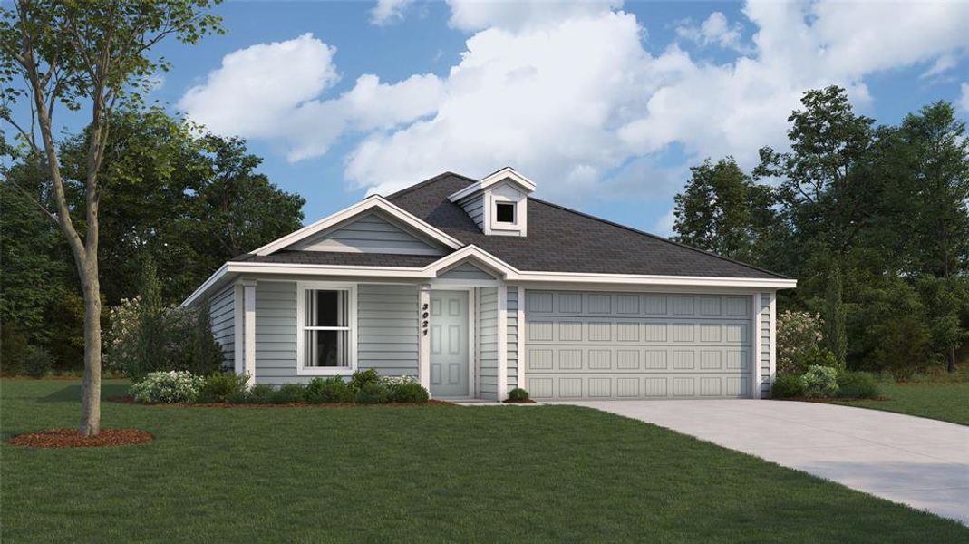 View of front of house featuring a front yard and a garage