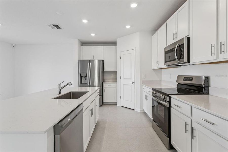 Furnished interior view inside a new home in , Clermont (Image 9). Furnished interior view inside a new home in , Clermont (Image 9).
