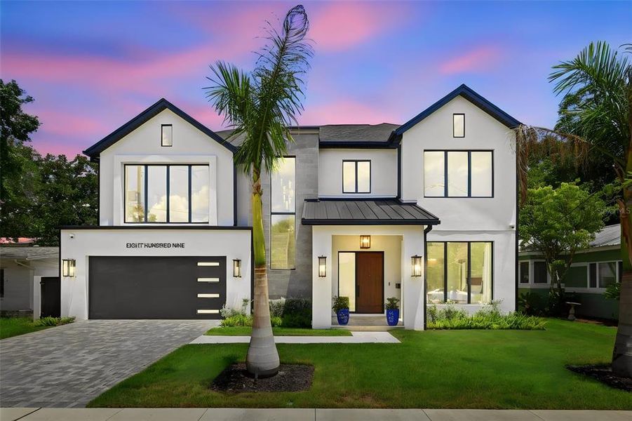 Front exterior of a new home in , Orlando, FL, highlighting curb appeal (Image 1). Front exterior of a new home in , Orlando, FL, highlighting curb appeal (Image 1).
