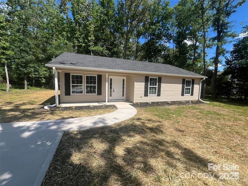 Front exterior of a new home in , Chester, SC, highlighting curb appeal (Image 1).