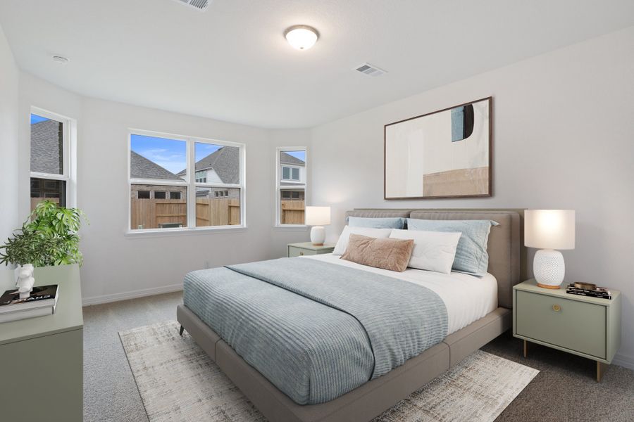 Primary bedroom. Note: Sample product photo - actual exterior and interior selections may vary by homesite