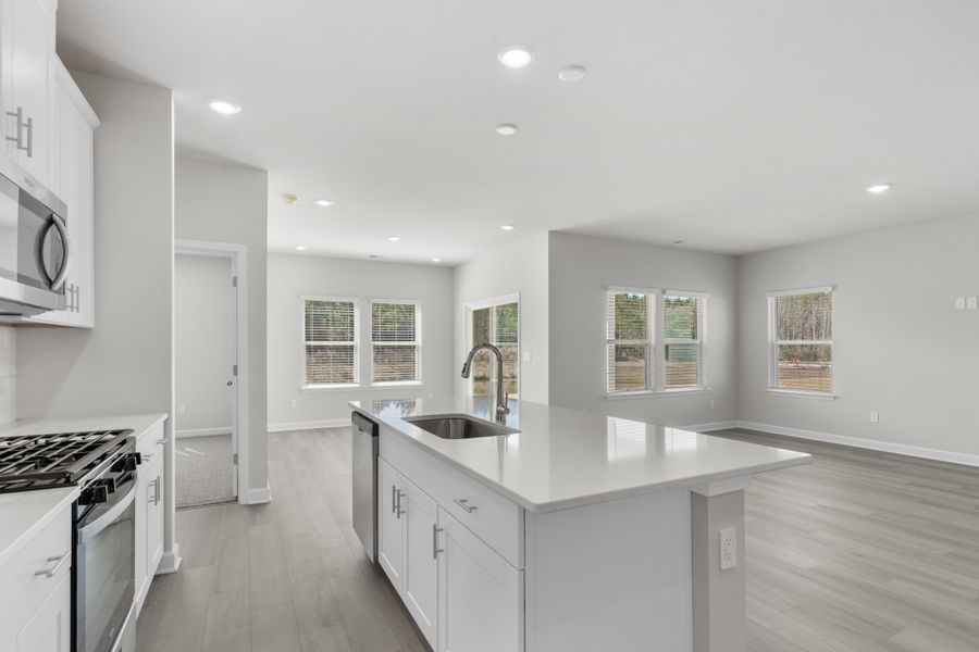 Furnished interior view inside a new home in Waterside - Coastline Series, Longs (Image 13).