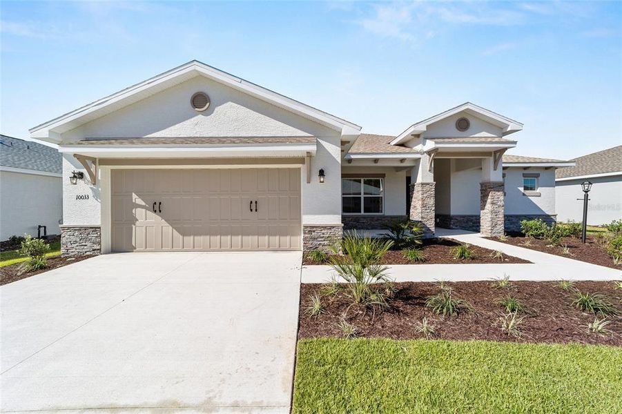 Front exterior of a new home in , Ocala, FL, highlighting curb appeal (Image 20). Front exterior of a new home in , Ocala, FL, highlighting curb appeal (Image 20).