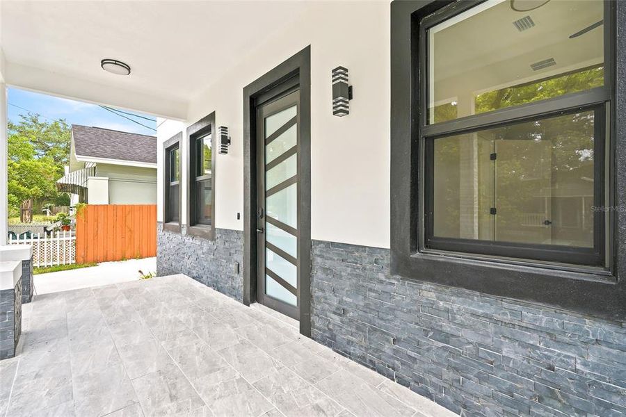 Exterior details and patio area of a home in , Tampa (Image 24).