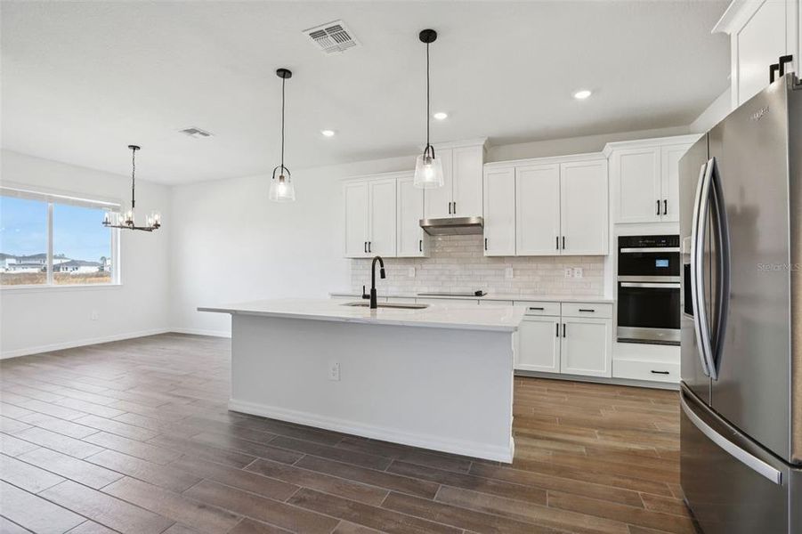Furnished interior view inside a new home in Two Rivers - Signature Series, Zephyrhills (Image 7). Furnished interior view inside a new home in Two Rivers - Signature Series, Zephyrhills (Image 7).