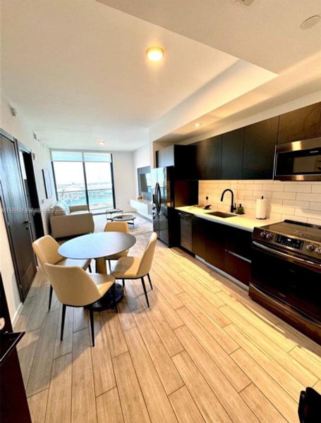 Furnished interior view inside a new home in The Elser Hotel & Residences, Miami (Image 9).