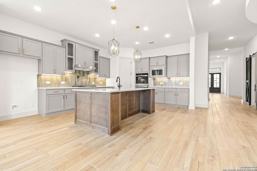 Furnished interior view inside a new home in Ventana - 70', Bulverde (Image 8).