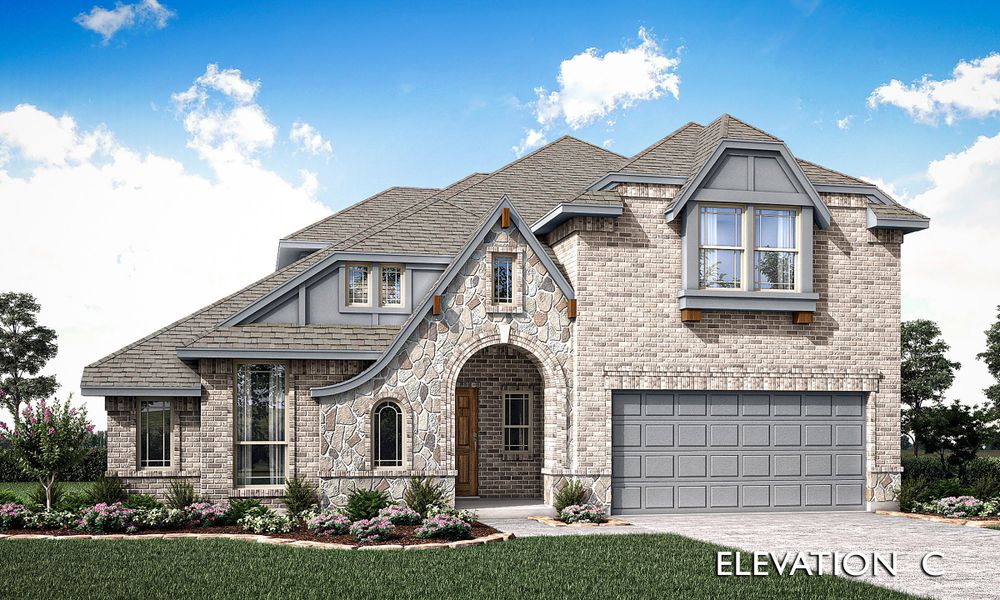 Two-story home with brick and stone exterior, arched entry, and two-car garage, Elevation C