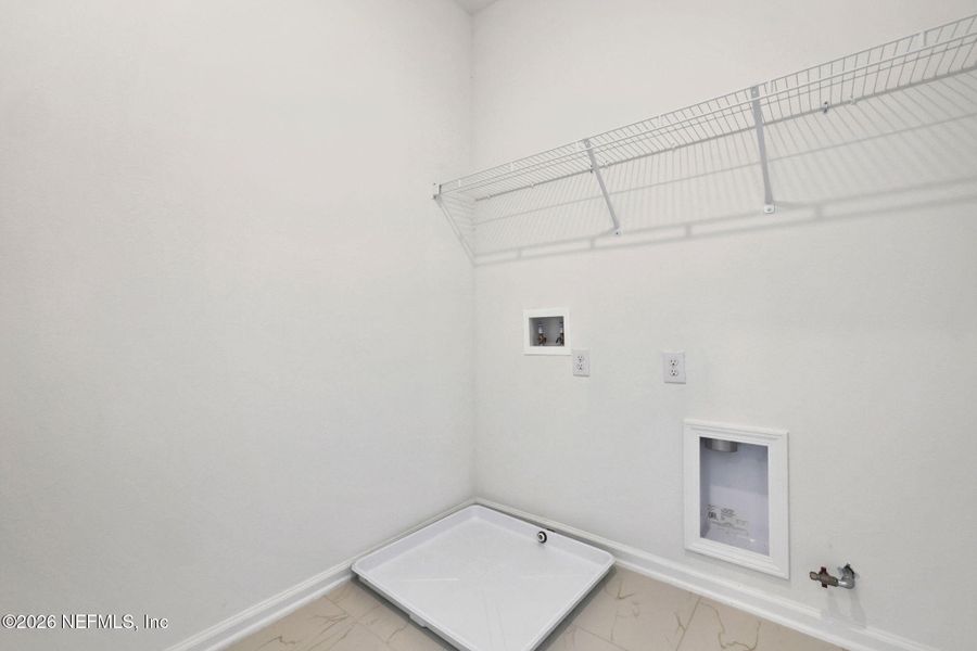 Spacious, unfurnished interior of a new home in TrailMark, St. Augustine (Image 19).