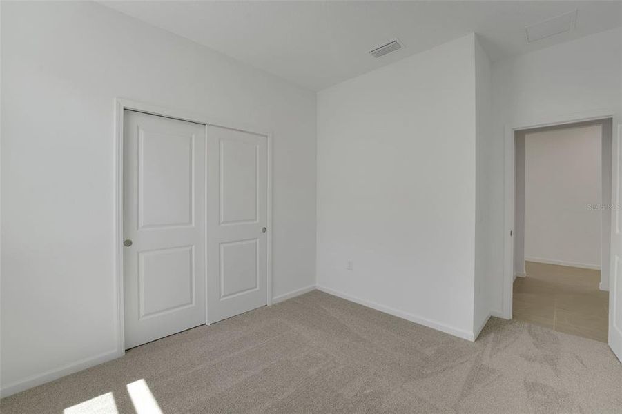 Spacious, unfurnished interior of a new home in Willowbrook North, Winter Haven (Image 25).