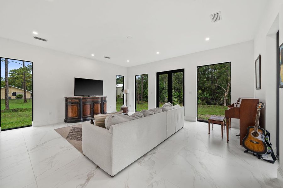 Furnished interior view inside a new home in , Palm Beach Gardens (Image 46).