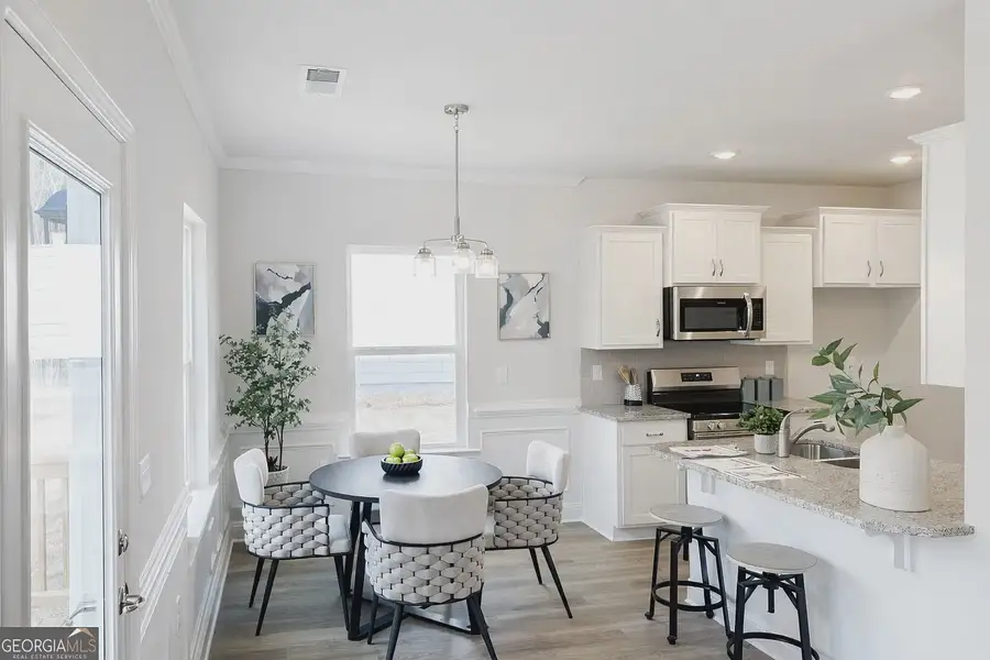 Furnished interior view inside a new home in Canterbury Villas, Carrollton (Image 7).