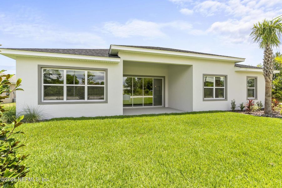 Exterior details and patio area of a home in , Palm Coast (Image 33).