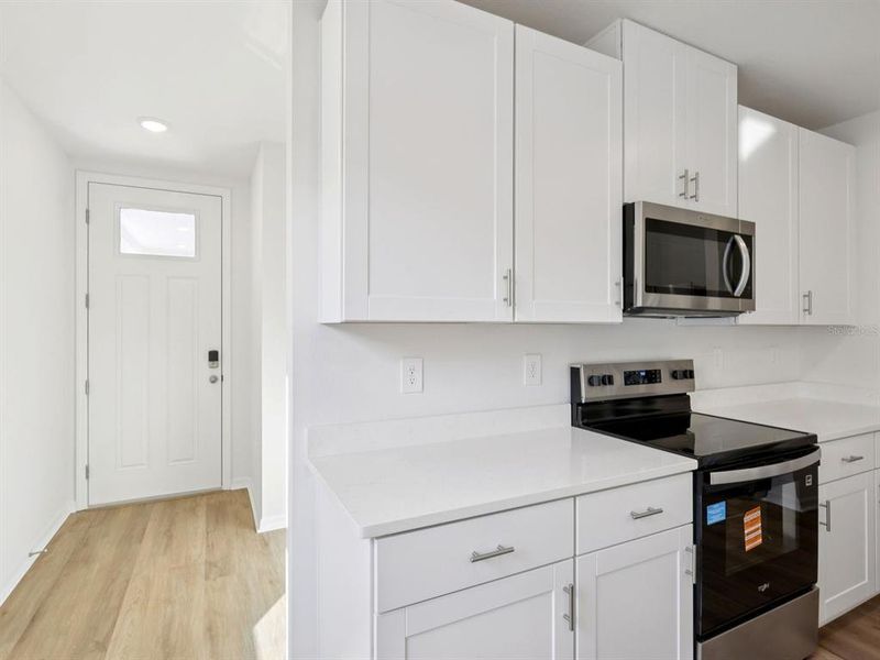 Furnished interior view inside a new home in Oakfield Trails - Premier Series, Parrish (Image 3).