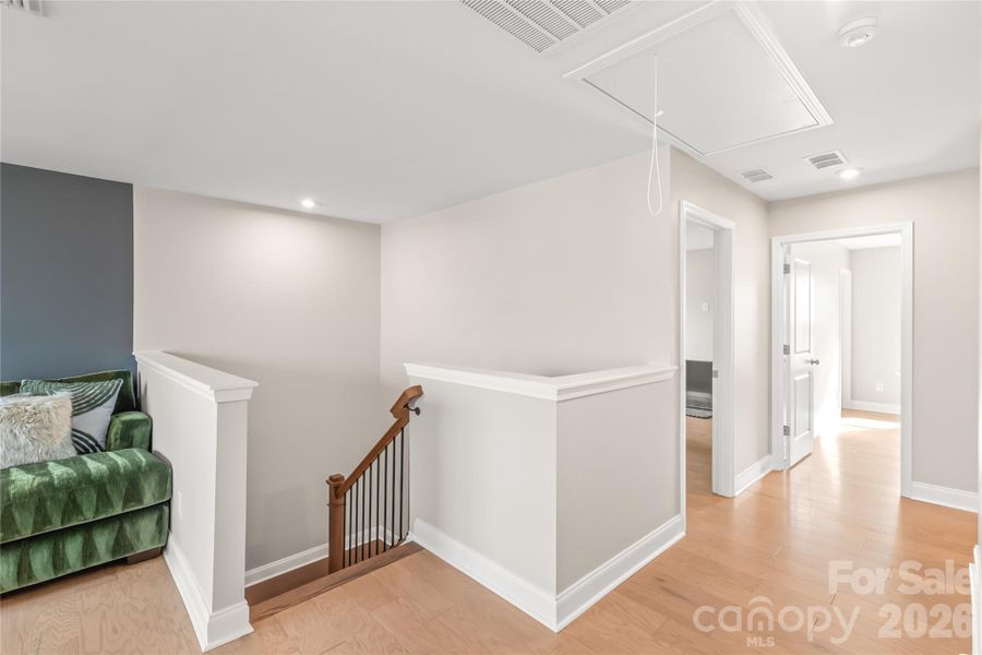 Entry to the second floor is bright and open too